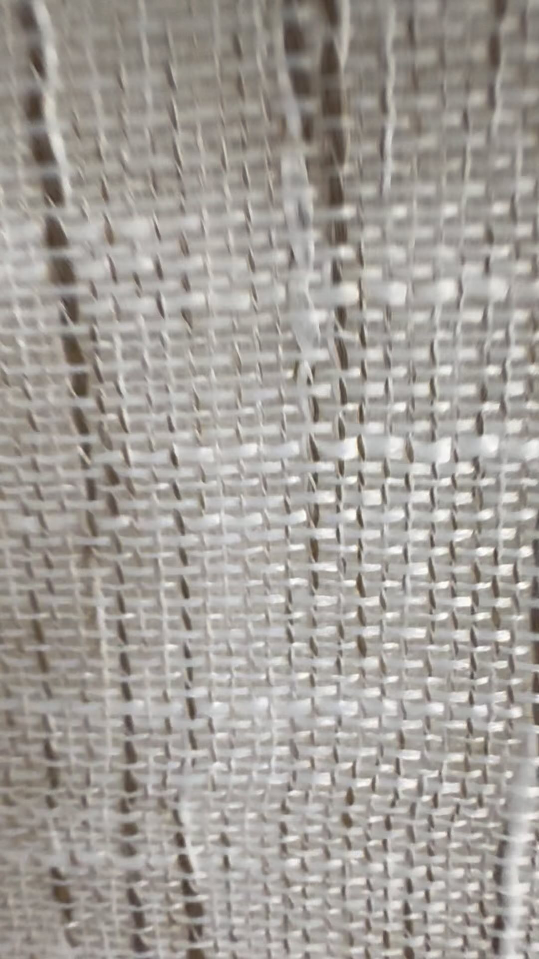 Close-up of an open woven sheer fabric